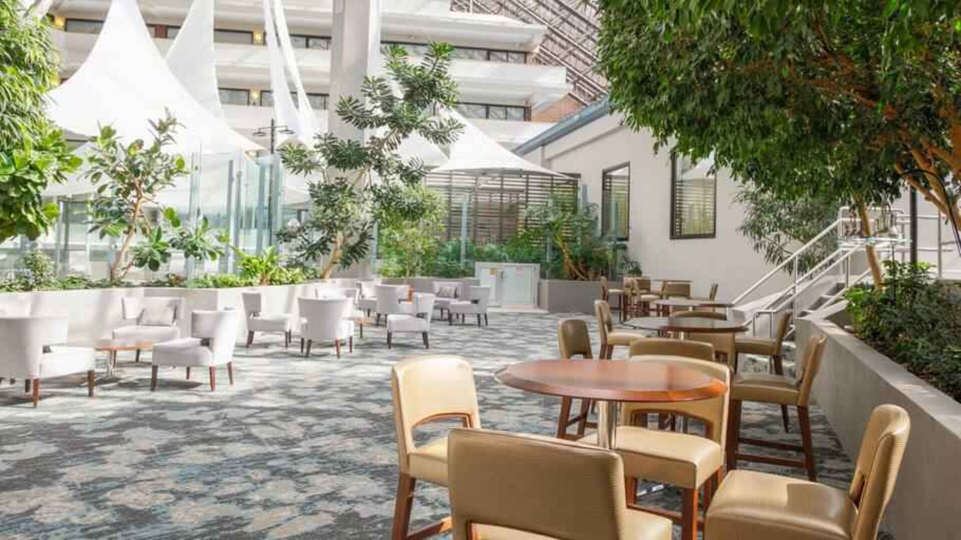 Outdoor patio perfect as workspace at the DoubleTree by Hilton Rochester.