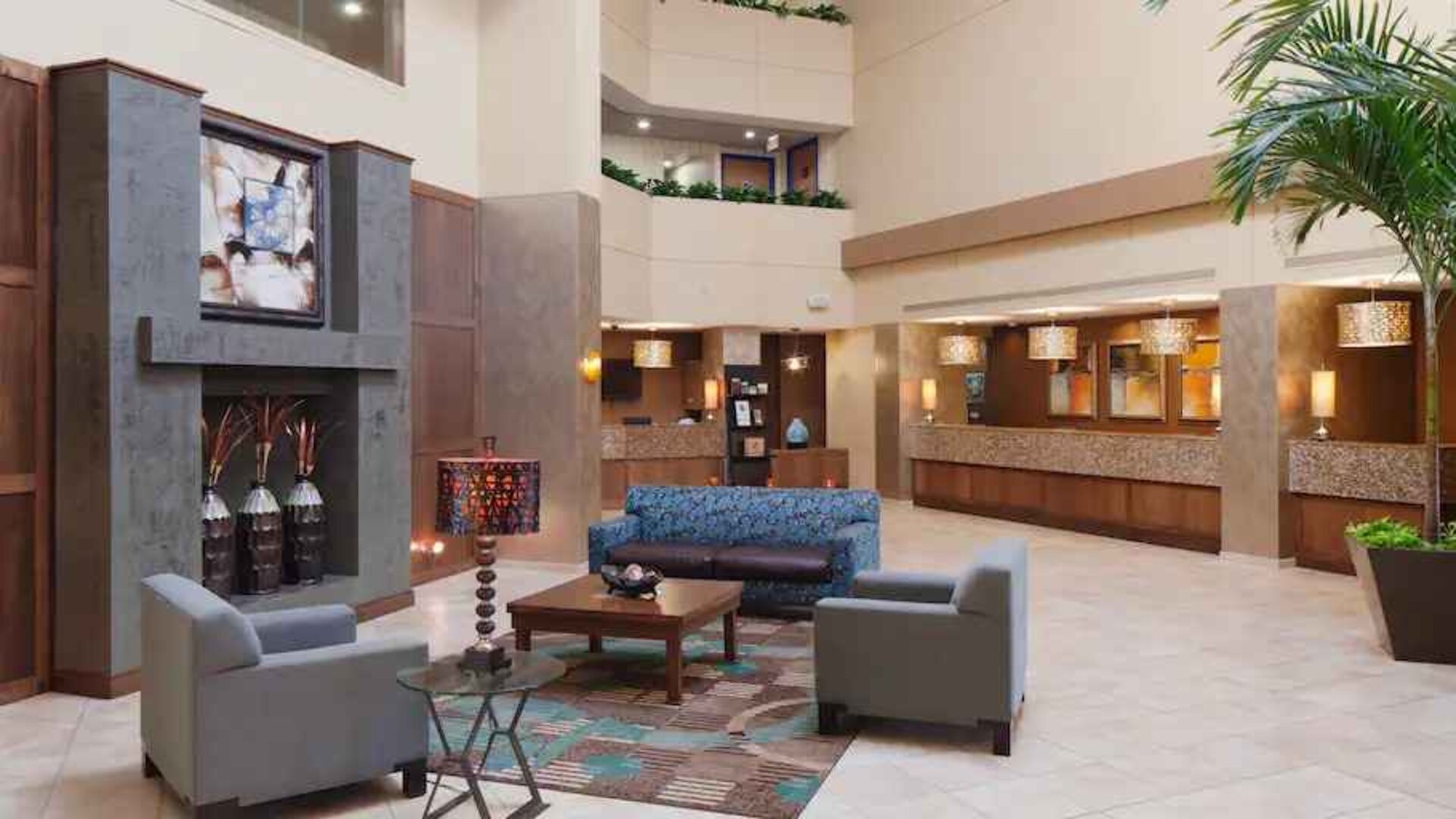 Comfortable lobby workspace with sofas at the DoubleTree Suites by Hilton Orlando - Disney Springs Area.