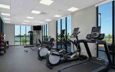 Bright fitness center with treadmills at the Hampton Inn Burley.