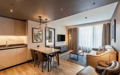 Hotel apartment with kitchen and living room at the Fellows House Cambridge, Curio Collection by Hilton.