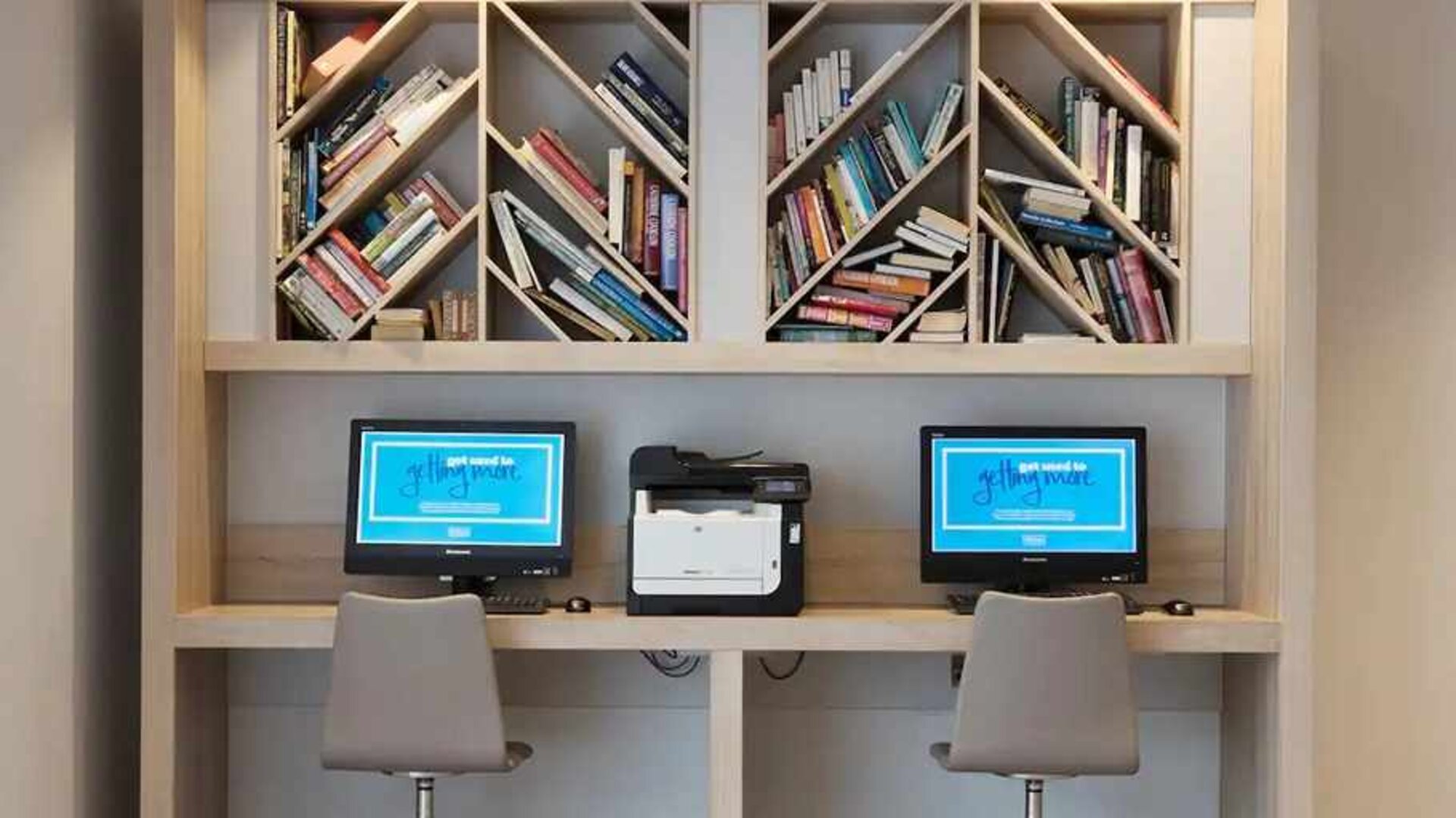 dedicated business center with workspace, PC, internet, and printer at Hampton by Hilton Exeter Airport.