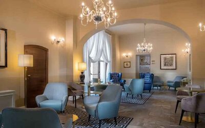 Stylish lobby workspace at the Grand Hotel Villa Torretta Milan Sesto, Curio Collection.