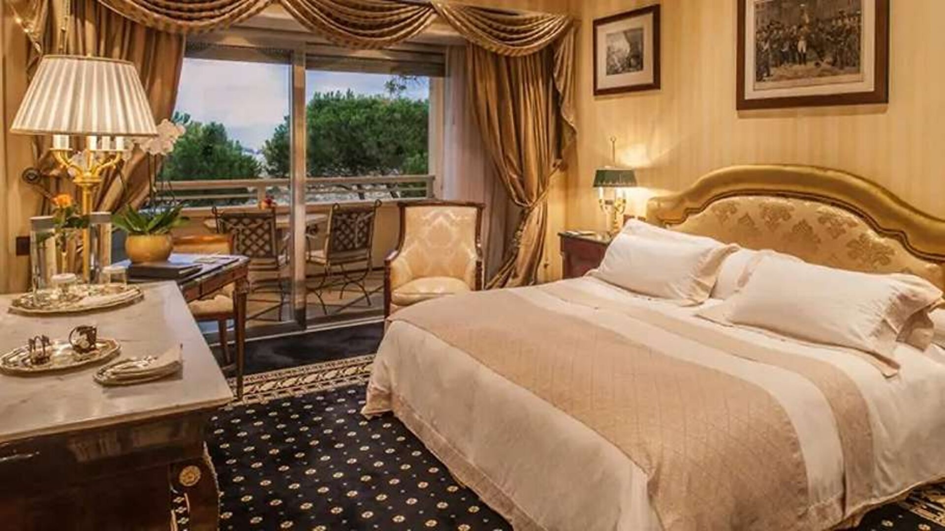 King bedroom with balcony at the Rome Cavalieri, A Waldorf Astoria Hotel.