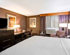 Spacious king room with TV and work desk at DoubleTree by Hilton Hotel Downtown Wilmington - Legal District.