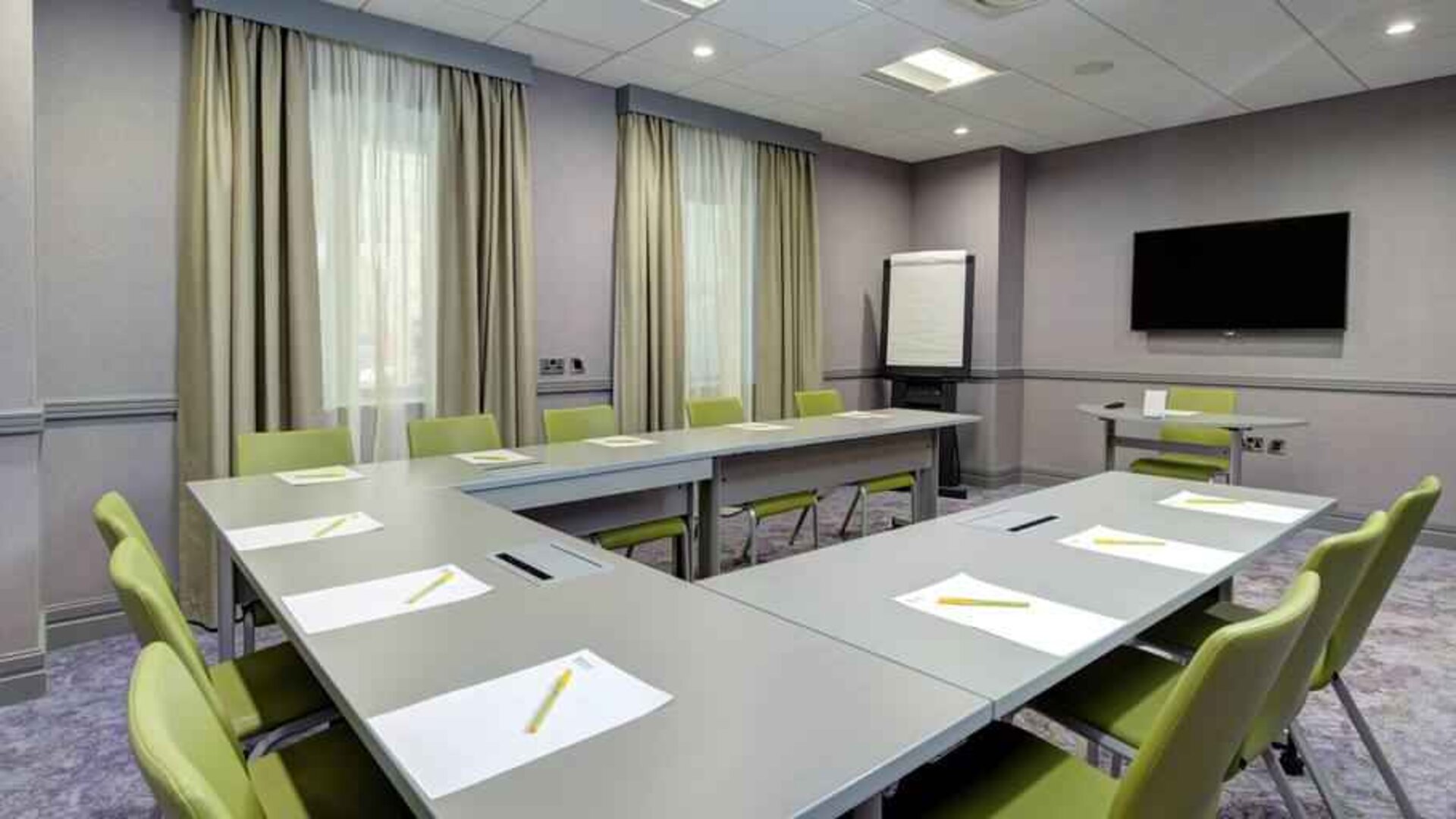 Small meeting room with u shape table at the Hilton Garden Inn Dublin Custom House.