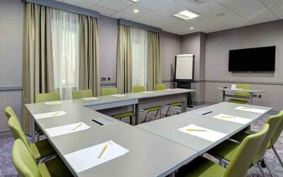 Small meeting room with u shape table at the Hilton Garden Inn Dublin Custom House.
