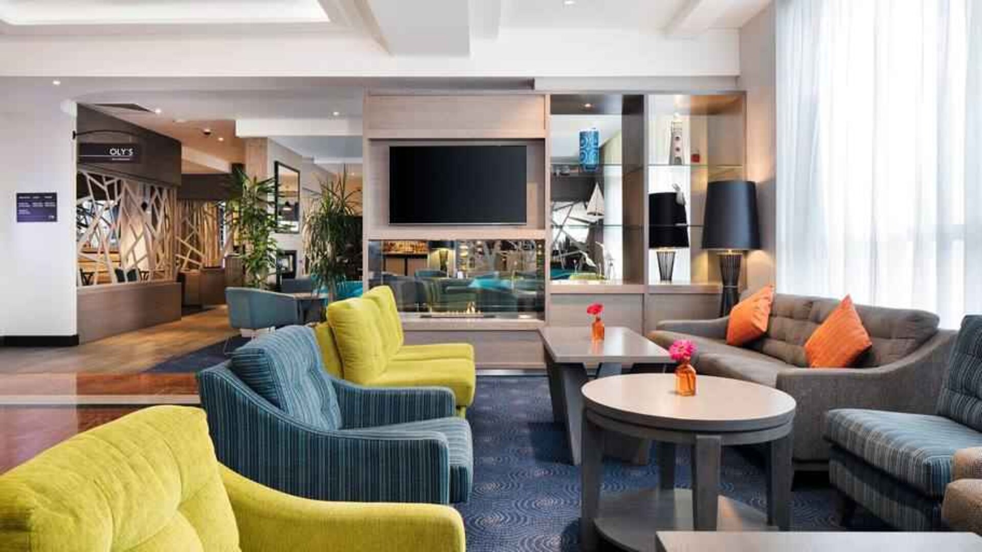 Comfortable lobby workspace with sofas at the Hilton Garden Inn Dublin Custom House.