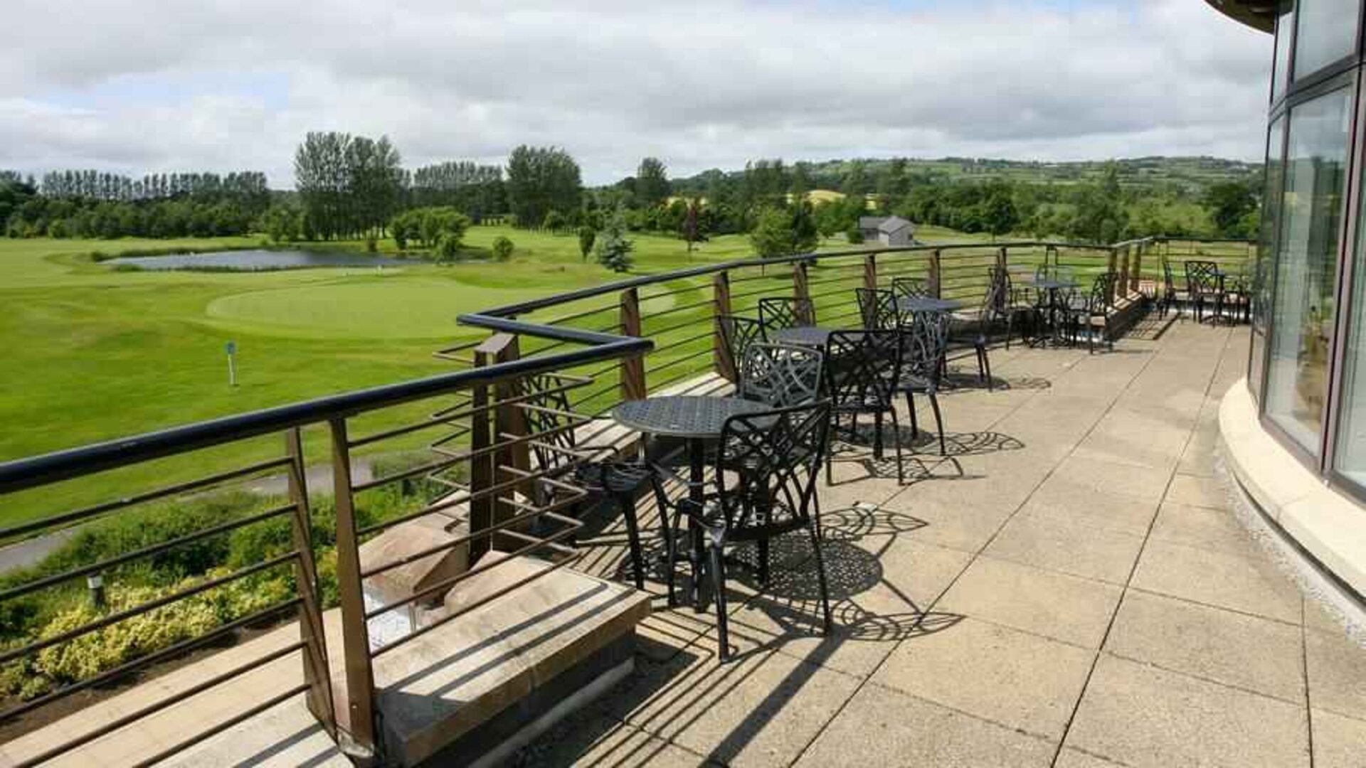Outdoor terrace overlooking the golf field at the Hilton Belfast Templepatrick Golf & Country Club.