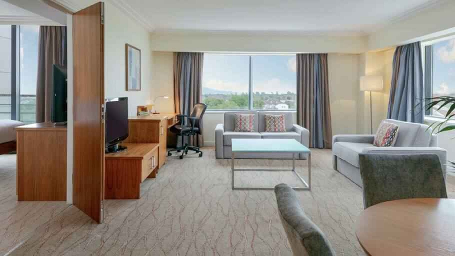 Comfortable living room in a hotel suite at the Hilton Dublin Airport.
