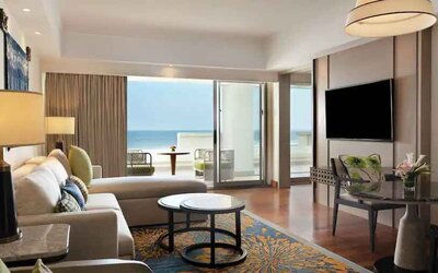 Comfortable living room with working station at the Hilton Bali Resort.