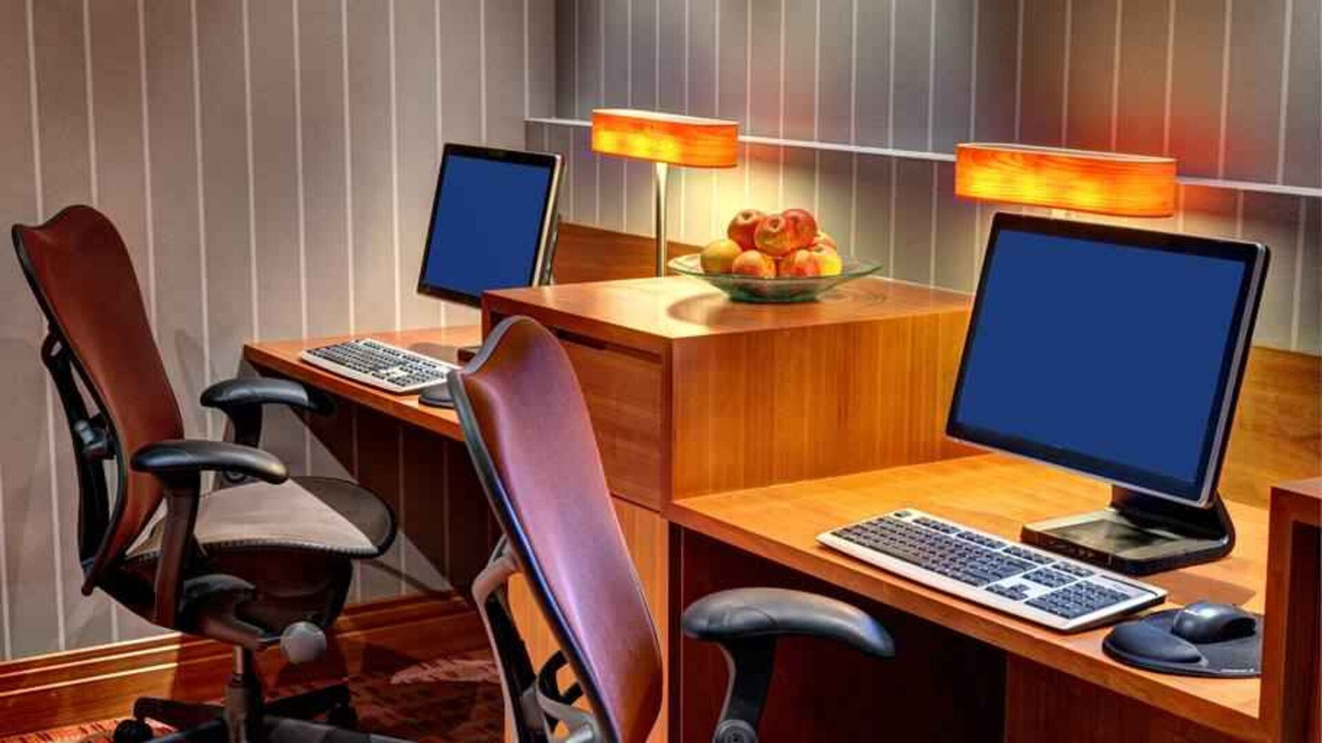 Business center with computers at the Hilton Garden Inn Frankfurt Airport.