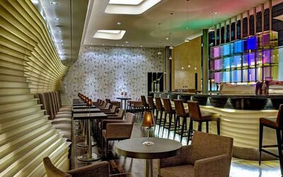 Stylish hotel workspace along the bar at the Hilton Frankfurt Airport.