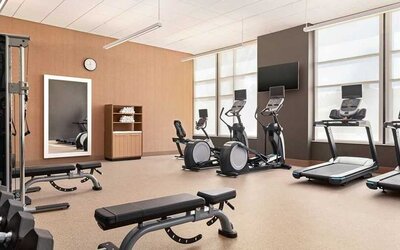 well equipped fitness center at Homewood Suites by Hilton Wilmington Downtown.