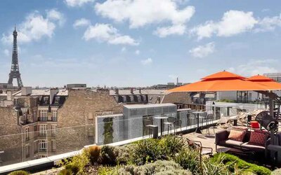 Beautiful outdoor terrace overlooking the city and the tour eiffel at the Canopy by Hilton Paris Trocadero.