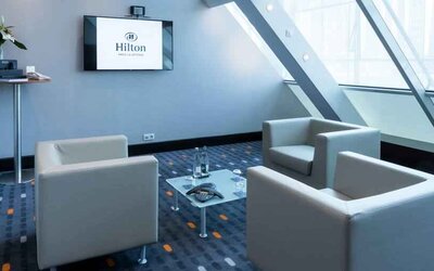 Hotel workspace with TV screen at the Hilton Paris La Defense.