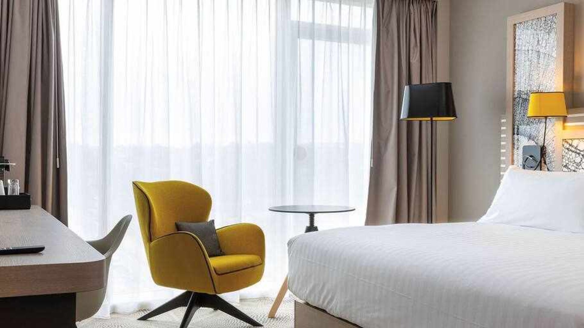 Hotel room with desk at the Hilton Garden Inn Tours Centre.