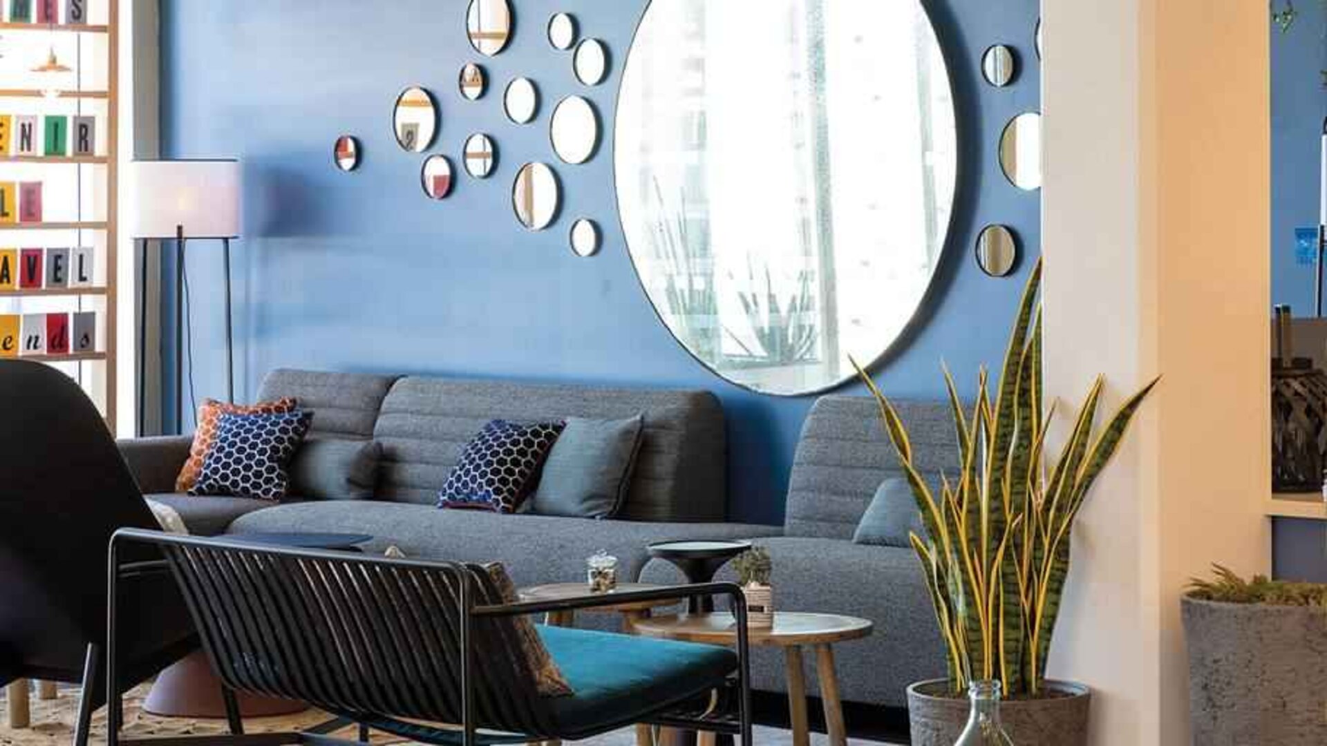 Comfortable lobby workspace at the Hampton by Hilton Tours Centre.