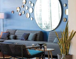 Comfortable lobby workspace at the Hampton by Hilton Tours Centre.