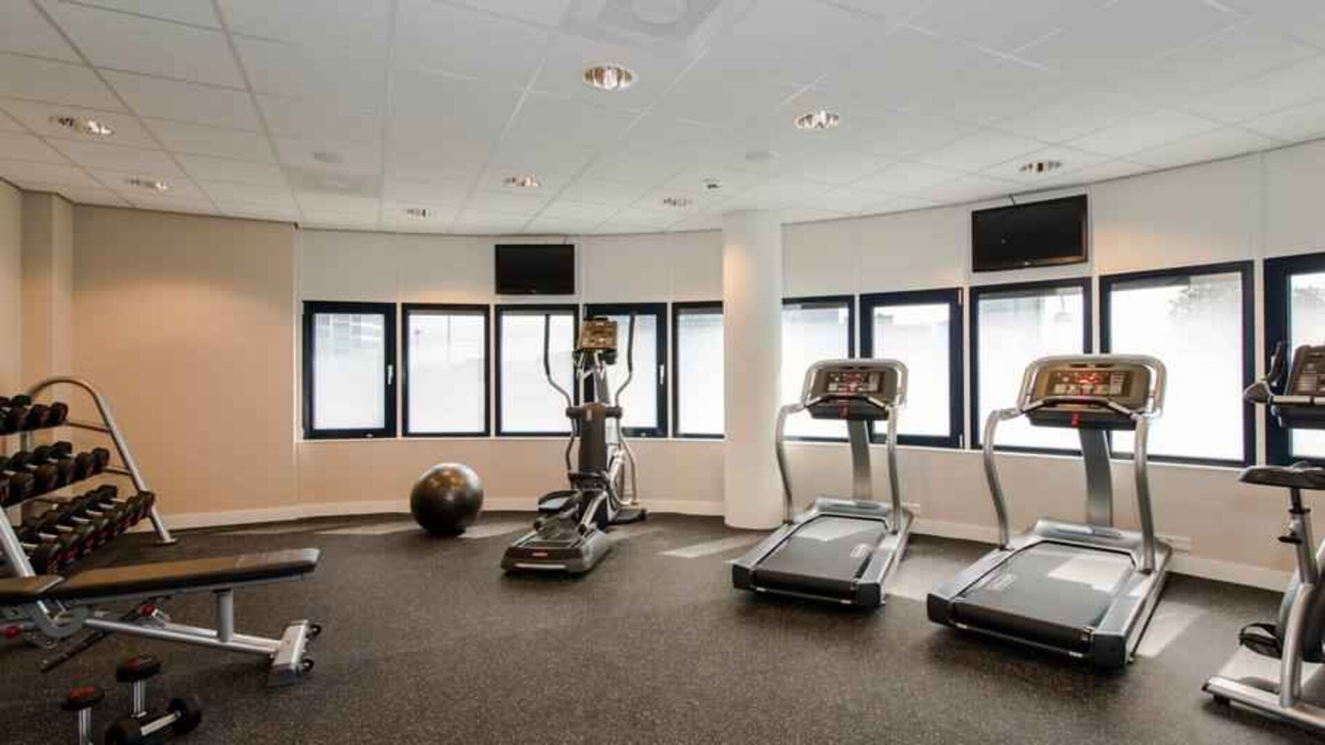 Fitness center with treadmill and machines at the Hampton by Hilton Amsterdam Airport Schiphol.