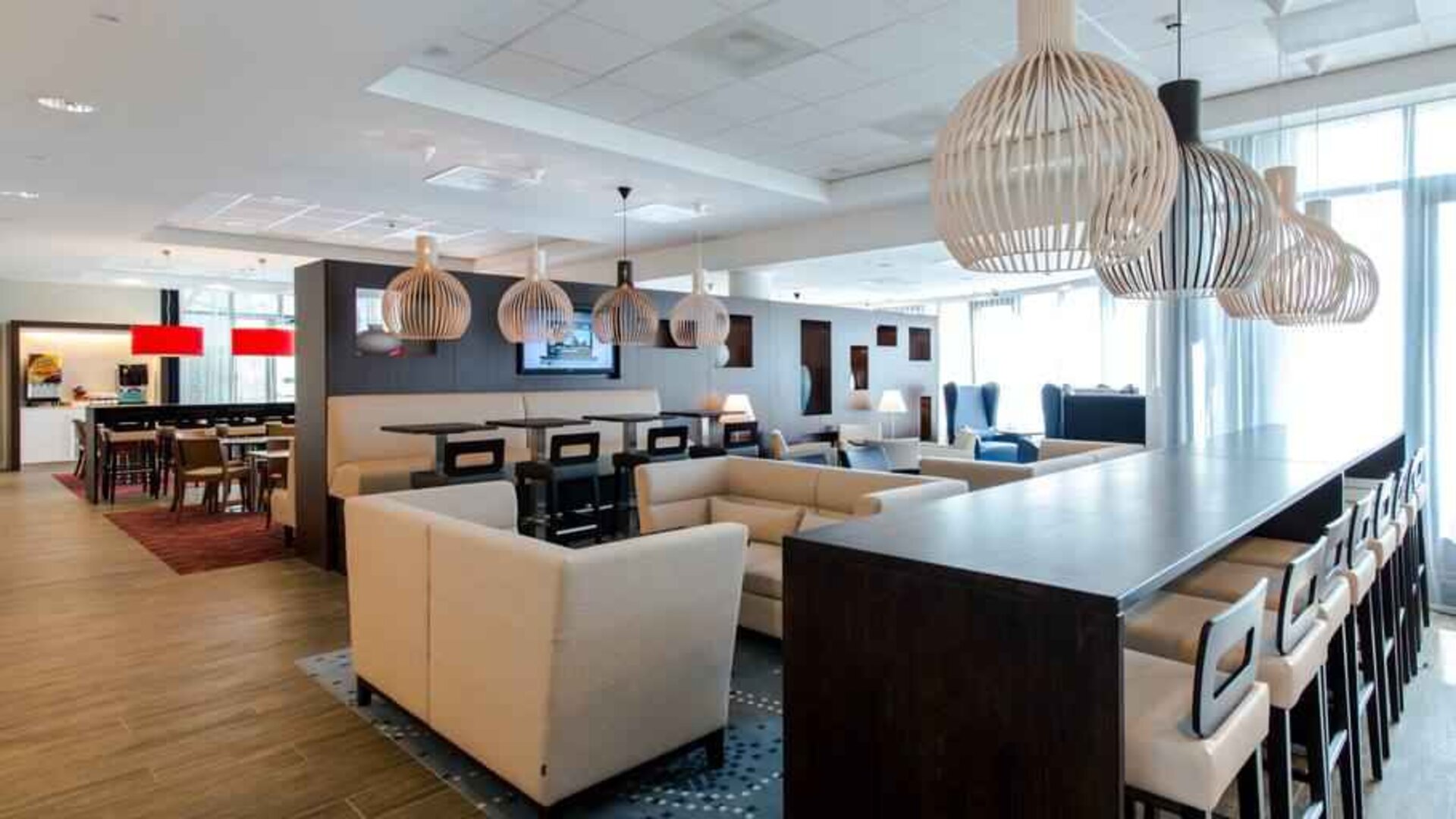Comfortable lobby workspace at the Hampton by Hilton Amsterdam Airport Schiphol.