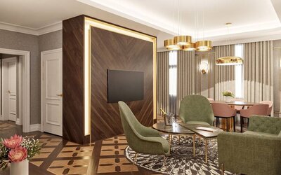 Living room with table, chairs and sofa at the Hotel Saski Krakow Curio Collection by Hilton.