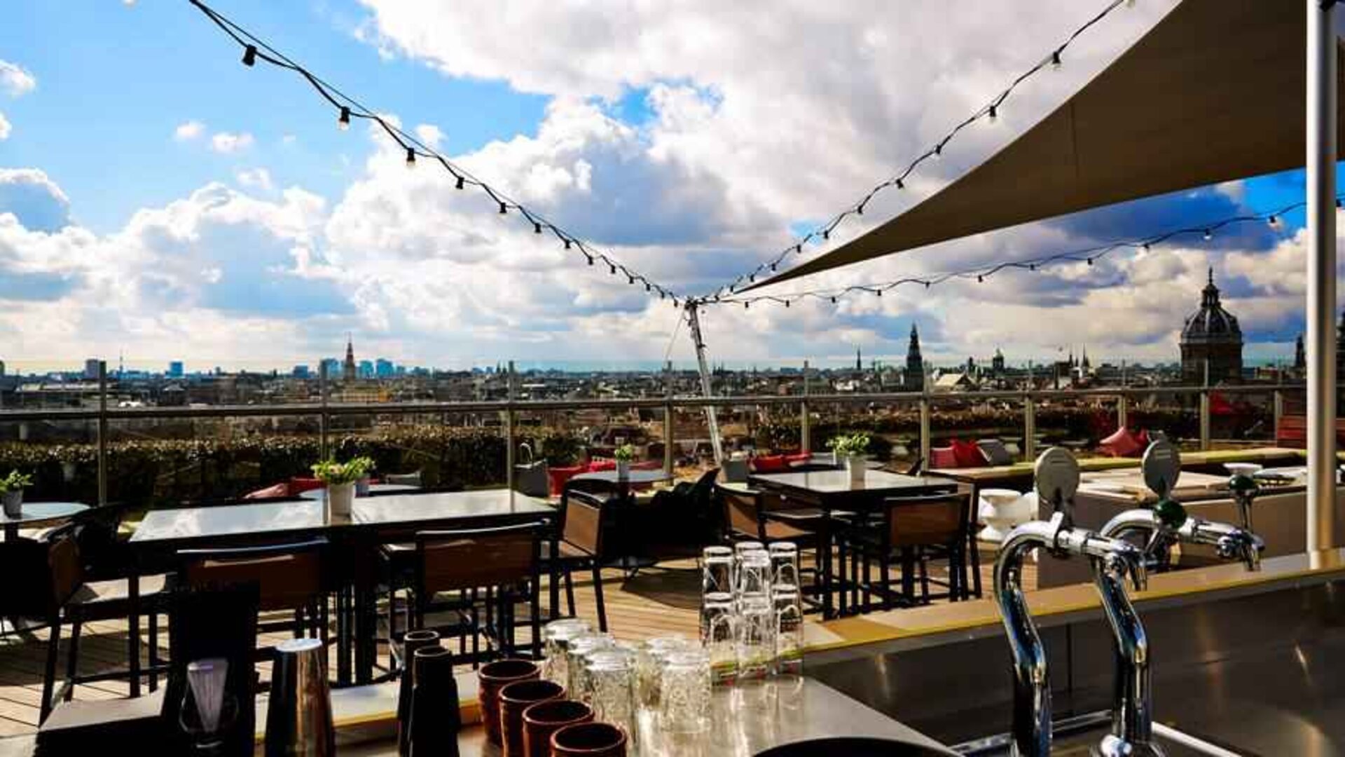 Beautiful outdoor terrace overlooking the city at the DoubleTree by Hilton Amsterdam Centraal Station.