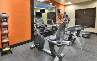 well equipped fitness center at Hampton Inn & Suites by Hilton San Jose-Airport.
