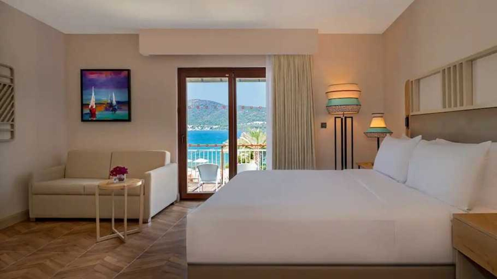 beautiful king suite with lounge and sea views at DoubleTree by Hilton Bodrum Isil Club Resort.