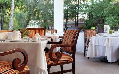 Outdoor patio perfect as workspace at the MM Grand Hotel Puebla, Tapestry Collection by Hilton.