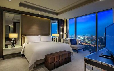 luxurious king room with TV and city views at Hilton Istanbul Bomonti Hotel & Conference Center.