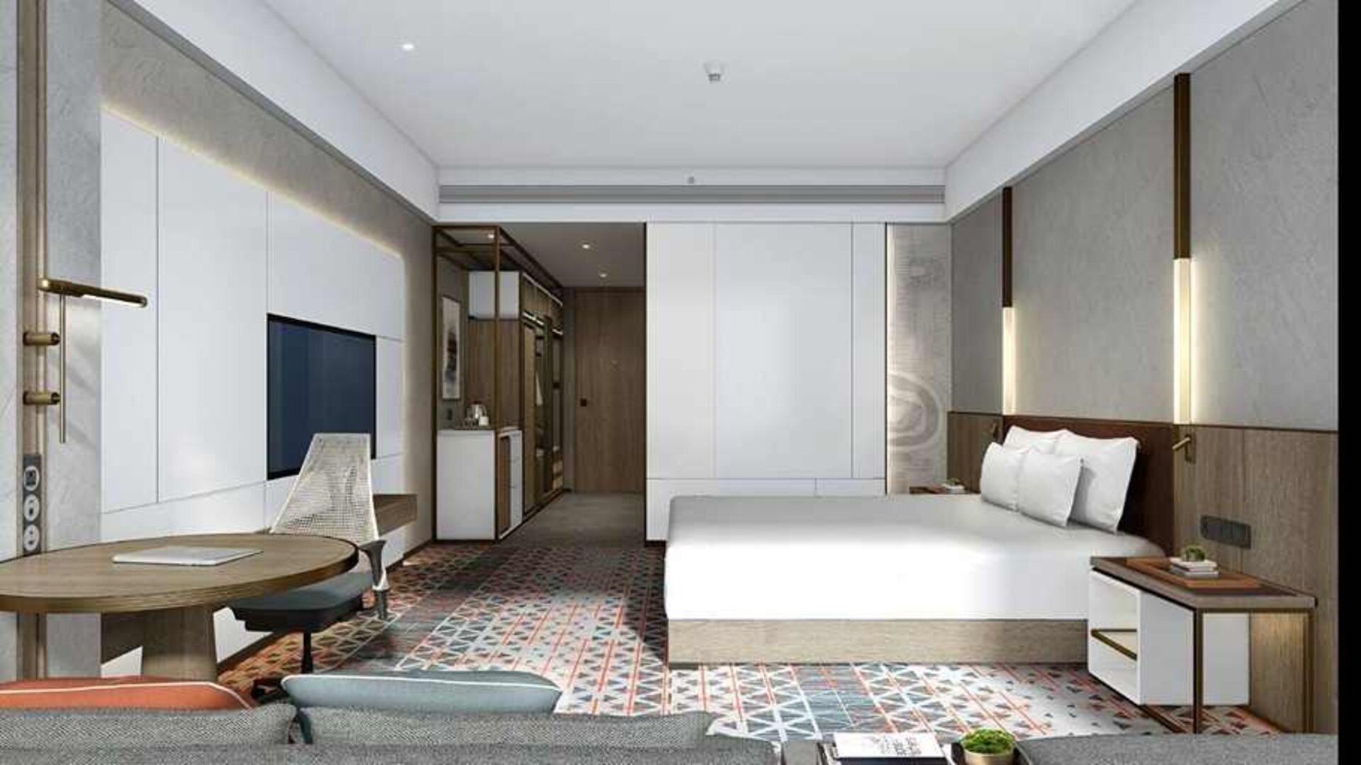 spacious king bedroom with chair, desk, and couch at DoubleTree by Hilton Kunming Airport.