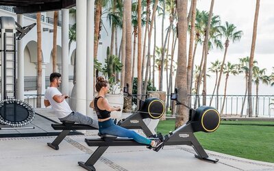 Outdoor fitness center overlooking the garden at the Hilton Los Cabos Beach & Golf Resort.