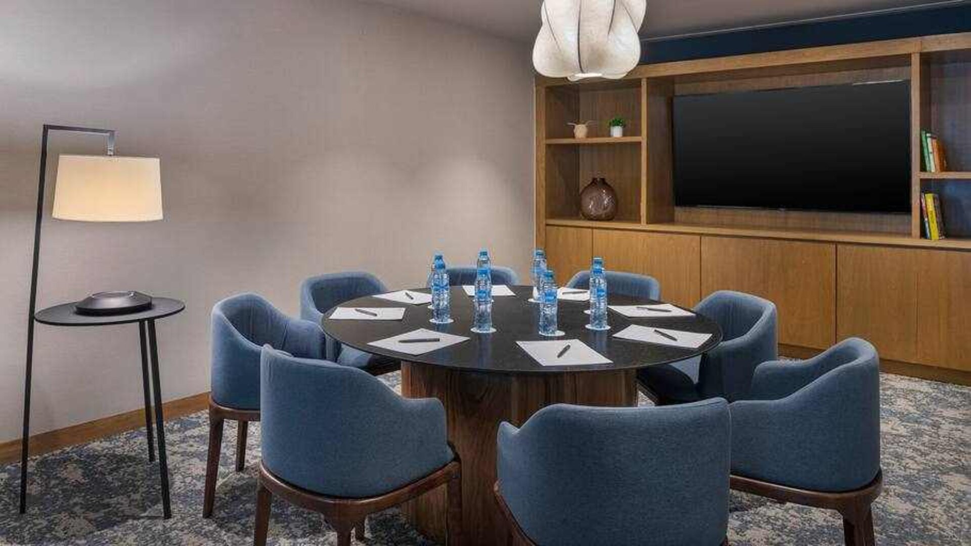 Meeting room with round table at the Hilton Garden Inn Cancun Airport.