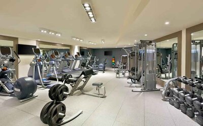 Fully equipped fitness center at the DoubleTree by Hilton Doha - Old Town.