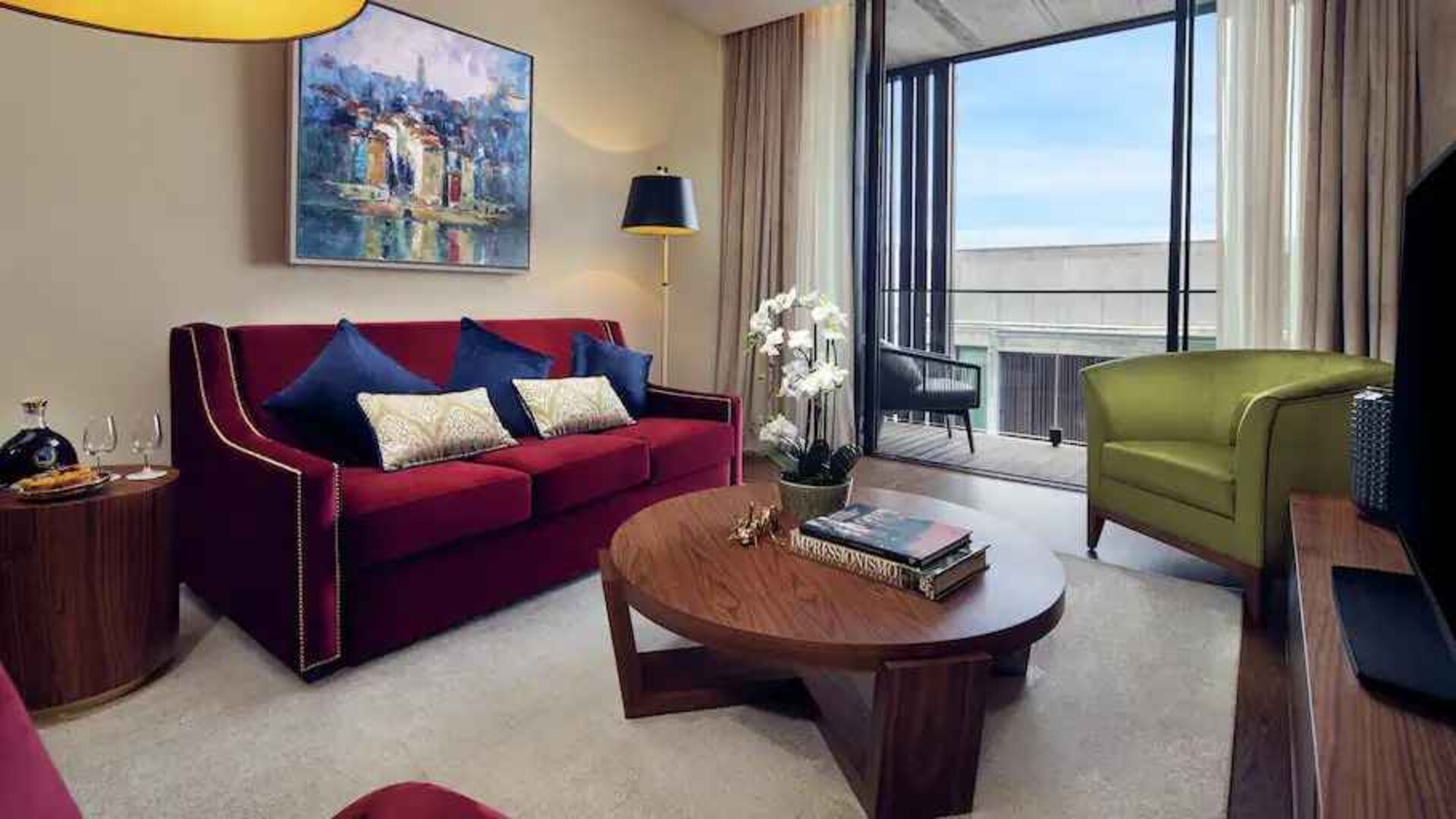 Living room perfect as workspace at the Boeira Garden Hotel Porto Gaia, Curio Collection by Hilton.