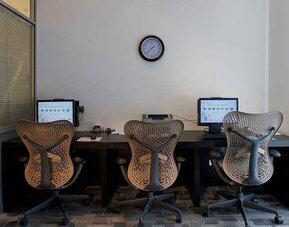dedicated business center with workspace, PC, internet, and printer at Hilton Garden Inn Kutahya.