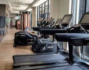 Fitness center with treadmills at the Hampton by Hilton Kalisz.
