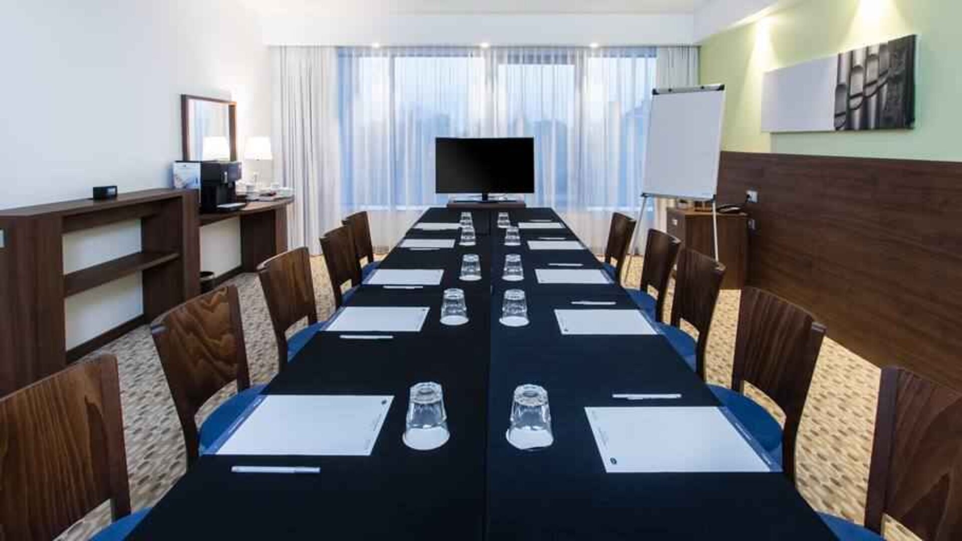 Meeting room with TV screen at the Hampton by Hilton Gdansk Oliwa.