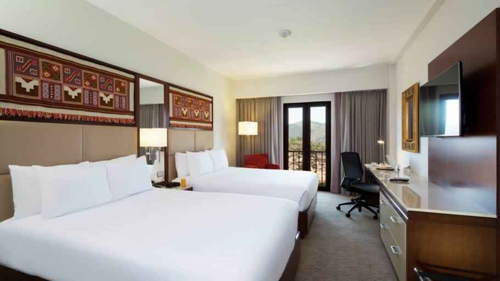 Twin room with desk at the Hilton Garden Inn Cusco, Peru.