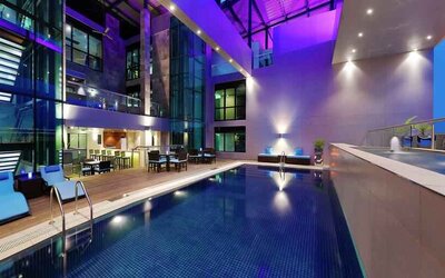 Swimming pool at the Legend Hotel Lagos Airport, Curio Collection by Hilton.