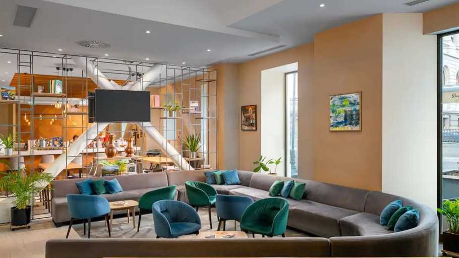 comfortable lobby and coworking space at Hilton Garden Inn Bucharest Old Town.