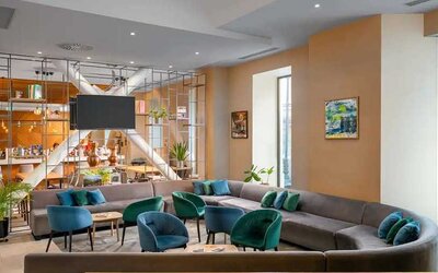 comfortable lobby and coworking space at Hilton Garden Inn Bucharest Old Town.