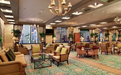 Comfortable workspace with sofas at the Madinah Hilton Hotel.