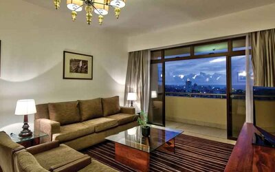Beautiful deluxe suite with balcony at the Hilton Colombo Residence.