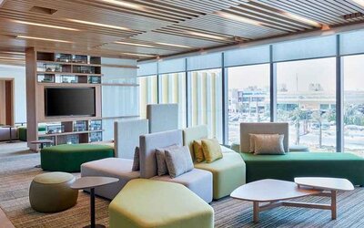 comfortable lobby and coworking space at Hilton Garden Inn Kuwait.