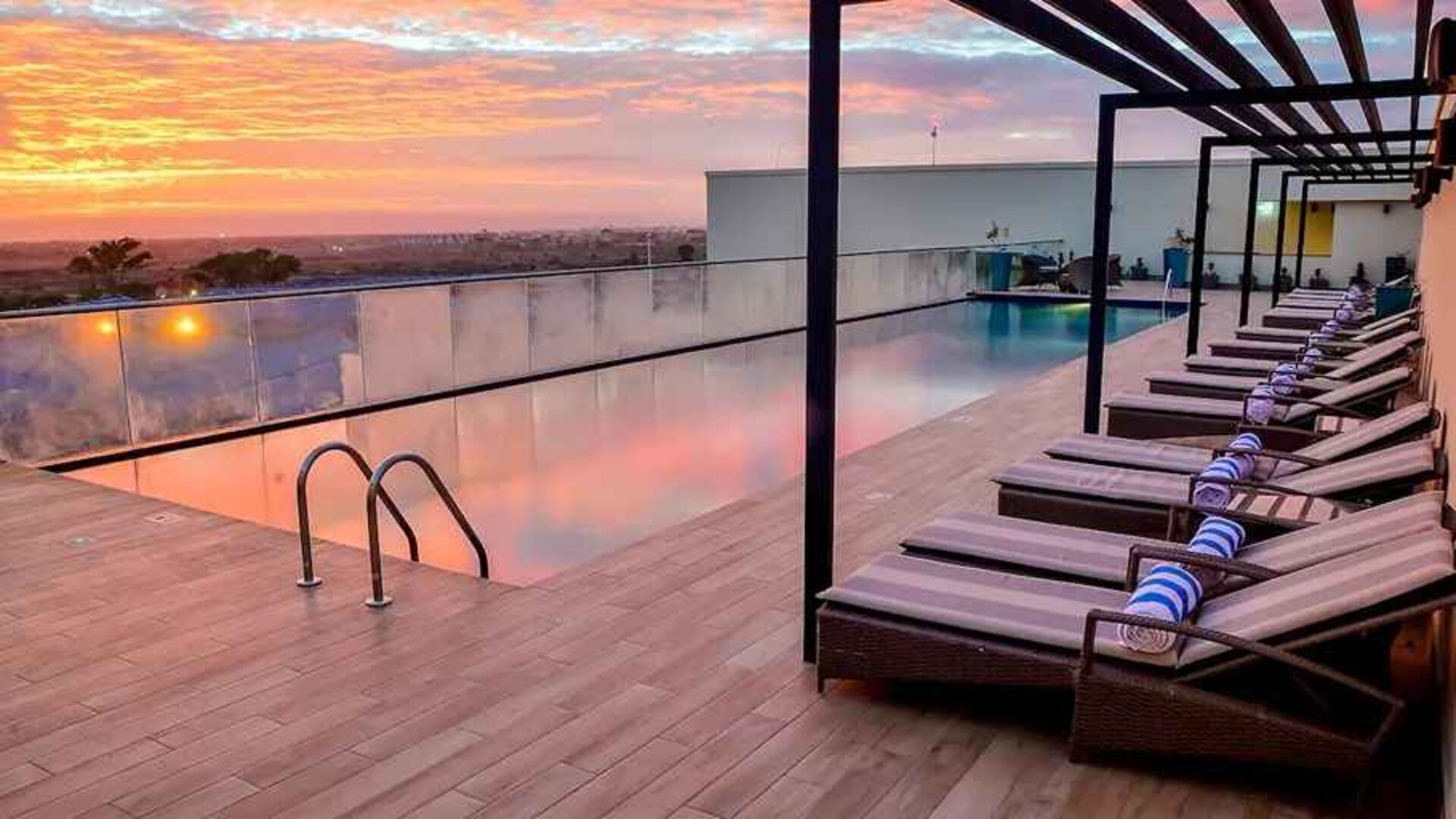 lovely outdoor pool with sun beds at Hilton Garden Inn Nairobi Airport.