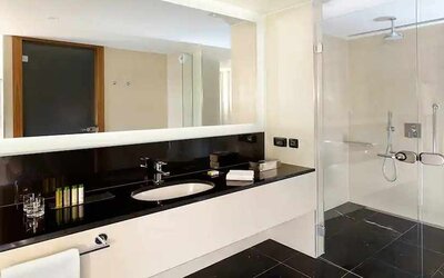 clean and spacious king bathroom with shower at DoubleTree by Hilton Zagreb.