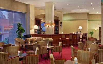 spacious lobby and coworking space at Hilton Alexandria Green Plaza.