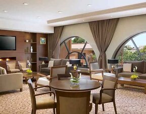 comfortable lobby and coworking space at Hilton Alexandria King's Ranch.