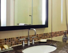 clean and spacious bathroom with shower at Hampton by Hilton Vadodara-Alkapuri.